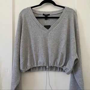 Cozy Ribbed v-neck sweater w/toggle hem drawstring